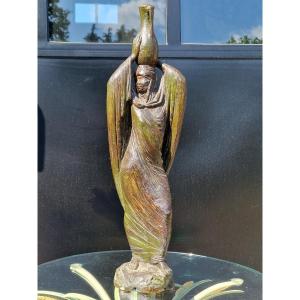 Bronze Patinated Plaster Statuette Carrying An Oriental Jar By Pierre Alfred Cazaubon.