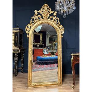 Napoleon III Period Mirror In Gilded Wood With Leaf Decorated With A Head And Flowers - 19th Century