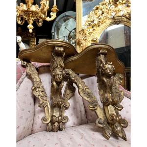 Pair Of Napoleon III Period Giltwood Wall Consoles Decorated With Cherub Heads