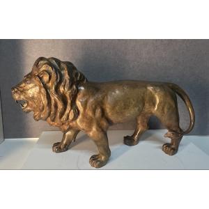 Solid Bronze Sculpture By Pierre Chenet Representing A Walking And Roaring Lion, 44 Cm