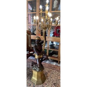 Large Electrified Torch Holder Decorated With A Nubian Figure, Illuminated By 10 Lights, Early 20th Century 