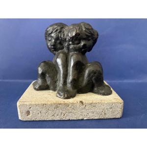 Statuette Of Two Children Back To Back 