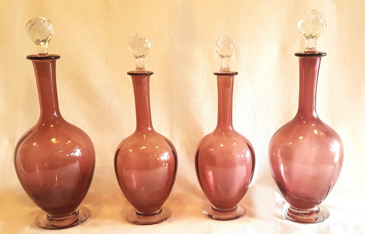 Quattro Antiche bottiglie In Vetro Soffiato Color vinaccia