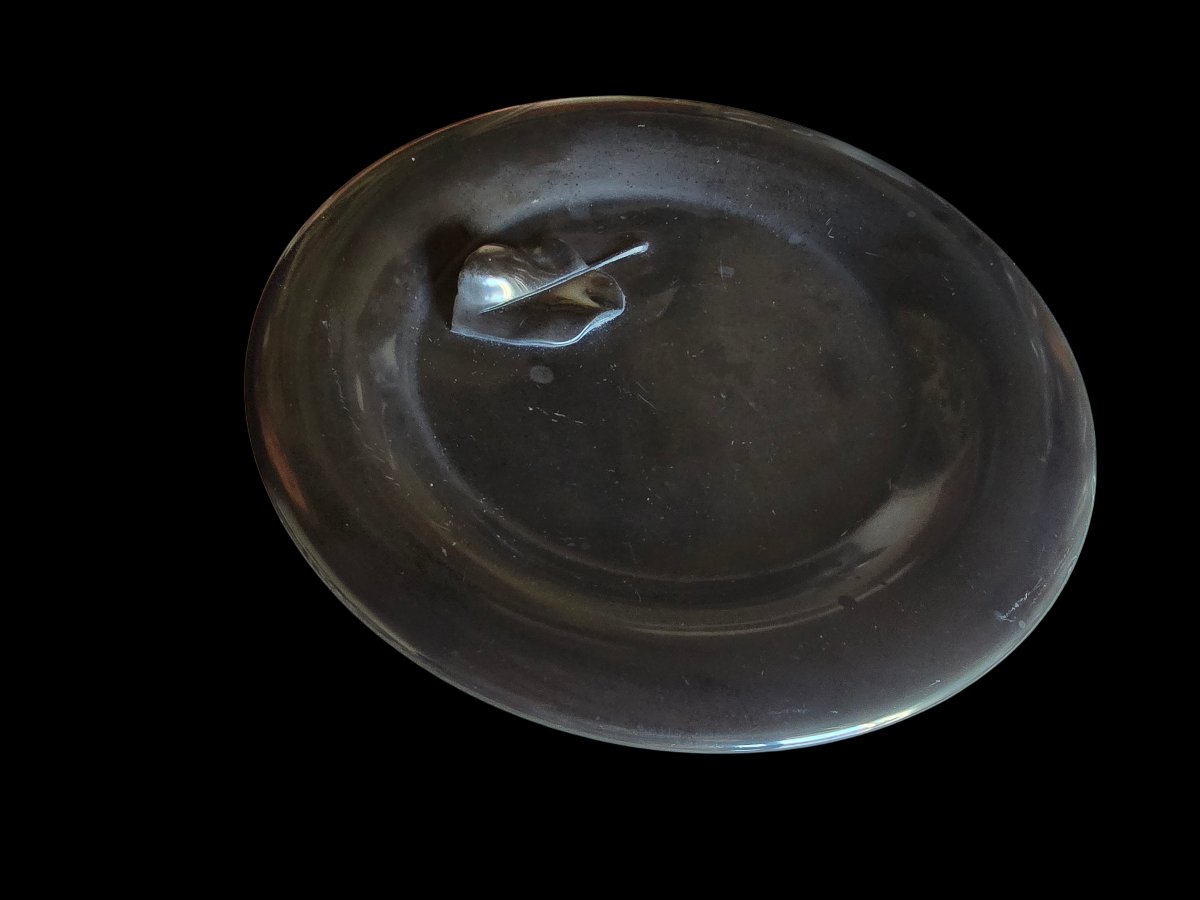 scultura piatto decorativo in basalto nero firmato G. Gozzani 1987