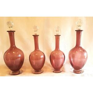 Quattro Antiche bottiglie In Vetro Soffiato Color vinaccia