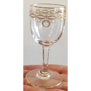 serie di 9 bicchierini da liquore antichi in cristallo inciso con fregio dorato