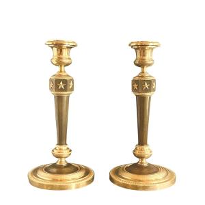 A Pair Of Empire Gilt-bronze And Patinated- Bronze Candlesticks After Claude Galle. 