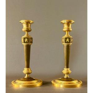 A Pair Of Empire Gilt-bronze And Patinated- Bronze Candlesticks After Claude Galle.
