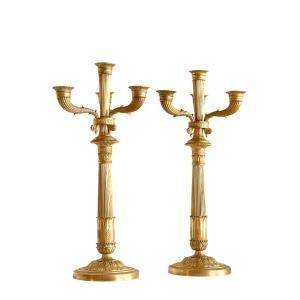 A  Pair Of Empire Gilt-bronze Candelabra With Four Light Arms. 