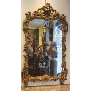 Large Provençal Mirror In Carved And Gilded Wood, Louis XV Period, 18th Century
