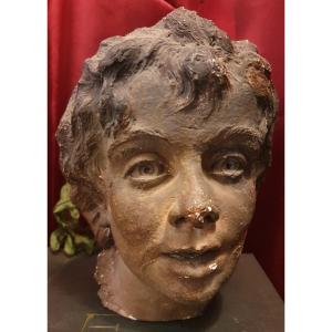 Sculpture Of A Woman's Head In Plaster With Brown Patina
