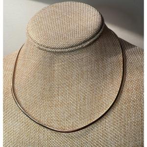 White And Yellow Gold Flexible Ribbon Necklace.