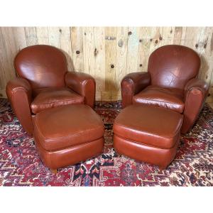 Pair Of Leather Club Chairs With Footrests.