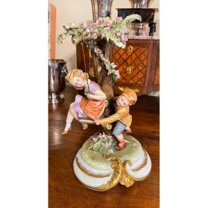 Capodimonte Porcelain Group "children At The Swing".