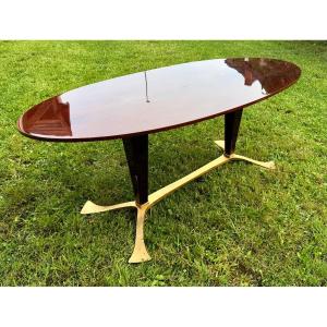 Art Deco Style Table With Oval Varnished Wooden Top And Gilded Iron Legs 