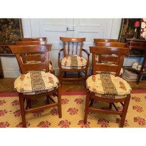 Set Of 6 Chairs And An Armchair Forming A Suite In Directoire Walnut.
