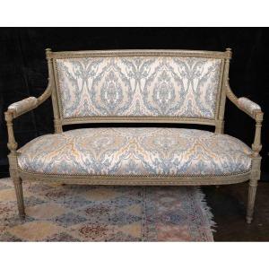 A Louis XVI Style Grey Rechampi Carved Wooden Sofa, 19th Century 