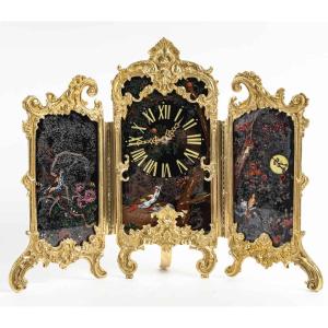 An Art Nouveau Gilt Bronze And Painted Glass Screen Clock 