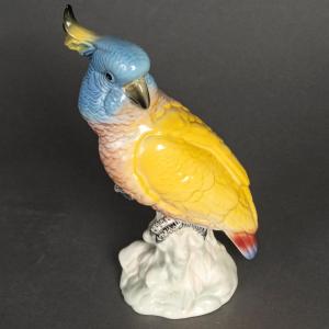 A Porcelain Parrot Sculpture, Early 20th Century 