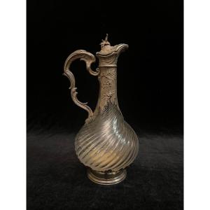 A Solid Silver And Cut Glass Ewer