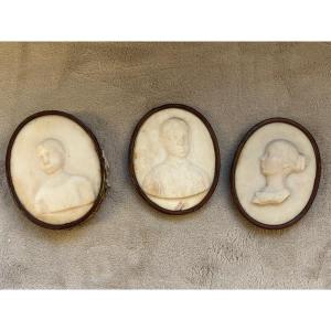 Three Marble Medals. Family Portrait. Leash