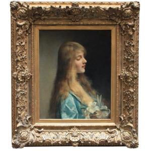 Portrait Of A Young Woman With Lilies By  Paul De La Boulaye (1849 - 1926)