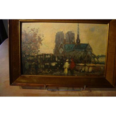 Paris Notre Dame personnages devant les bouquinistes /MAURICE DE MEYER