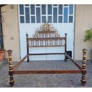 Letto in legno di noce con doratura del 600 Sardegna da palazzo nobile