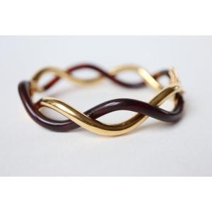 Boucheron Twisted Bracelet In 18k Yellow Gold And Tortoiseshell