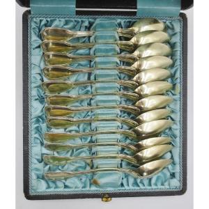 Suite Of Twelve Small Spoons In Vermeil.
