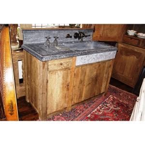 Rural Kitchen For Indoor And Outdoor Use With A Blue Stone Sink.