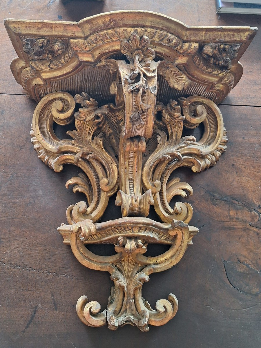 Consolle Luigi XIV in legno intagliato e dorato.