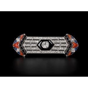 An Art-deco Diamond, Onyx, Coral And Sapphire Brooch