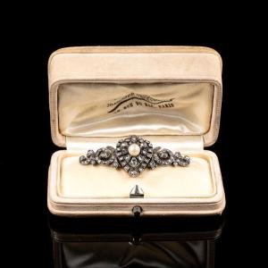 A Belle époque Diamond & Pearl Scroll Brooch | French C.1900