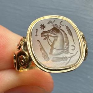 A Victorian Gold Signet Ring Set With An Agate Intaglio. Horse Promote With Attributes And Lett