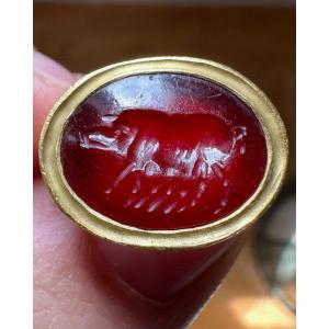 A Modern Gold Ring Set With A Roman Carnelian Intaglio. Sow.
