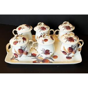 Six Limoges Porcelain Cream Pots Decorated With Pine Cones, With A Tray