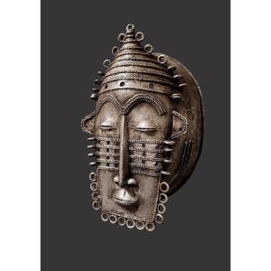 Dioula  Mask, Emblem Of Mastery, Aluminum Blacksmith.