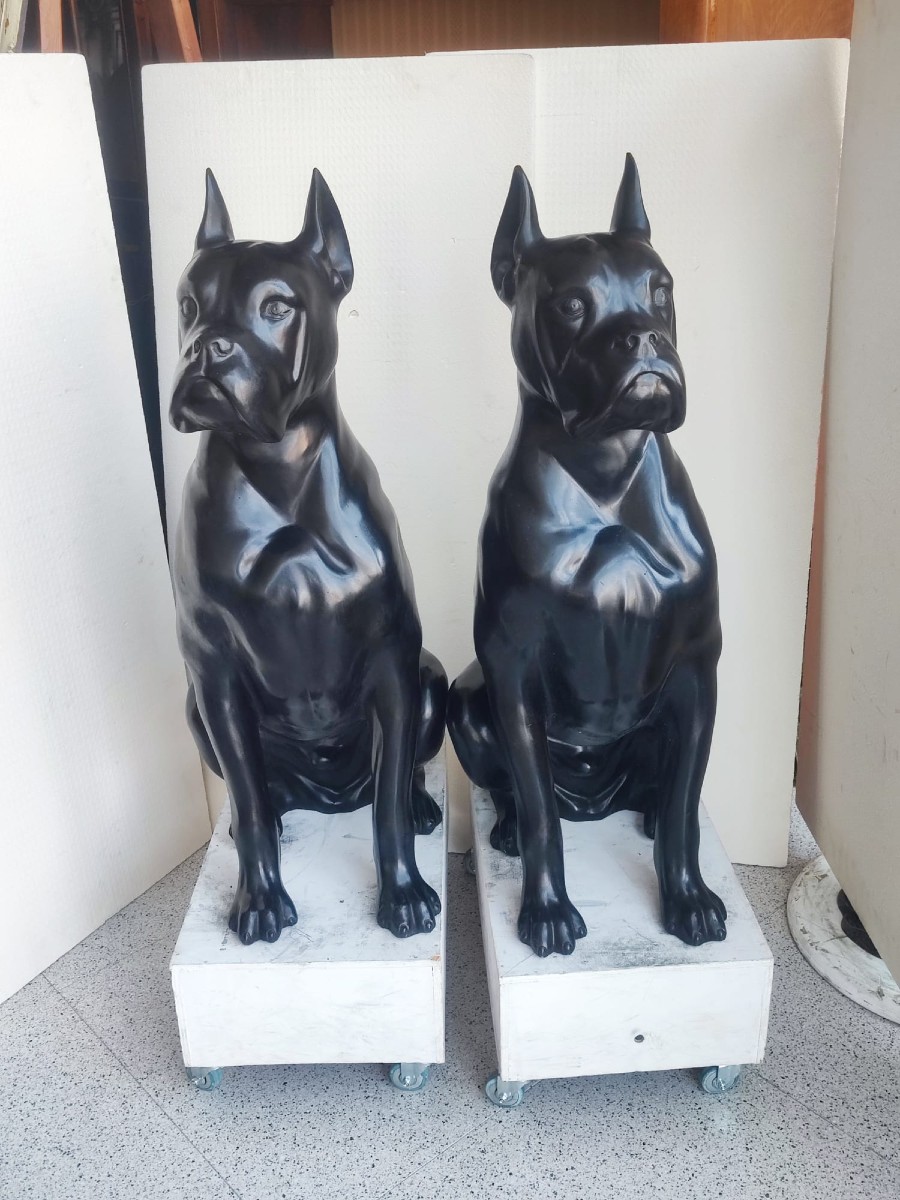 Coppia di cani in bronzo patinato