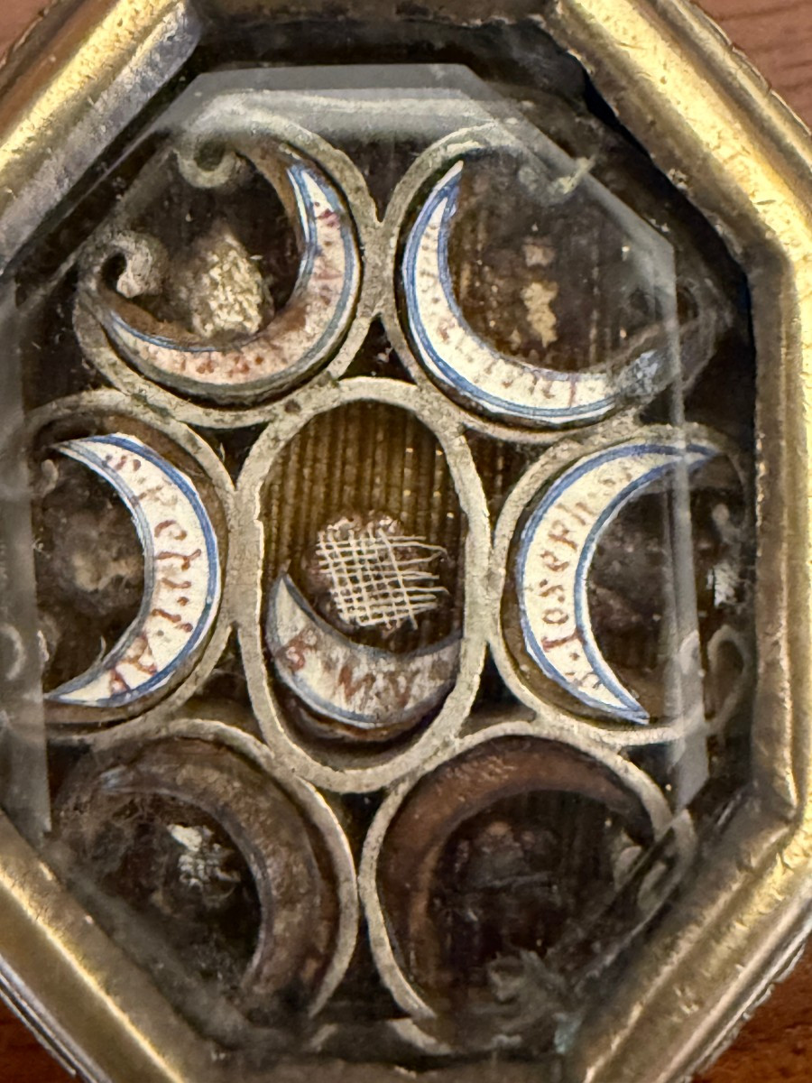 Reliquiario in bronzo di fattura ottagona a doppia faccia con frammenti di 14 santi  -photo-2