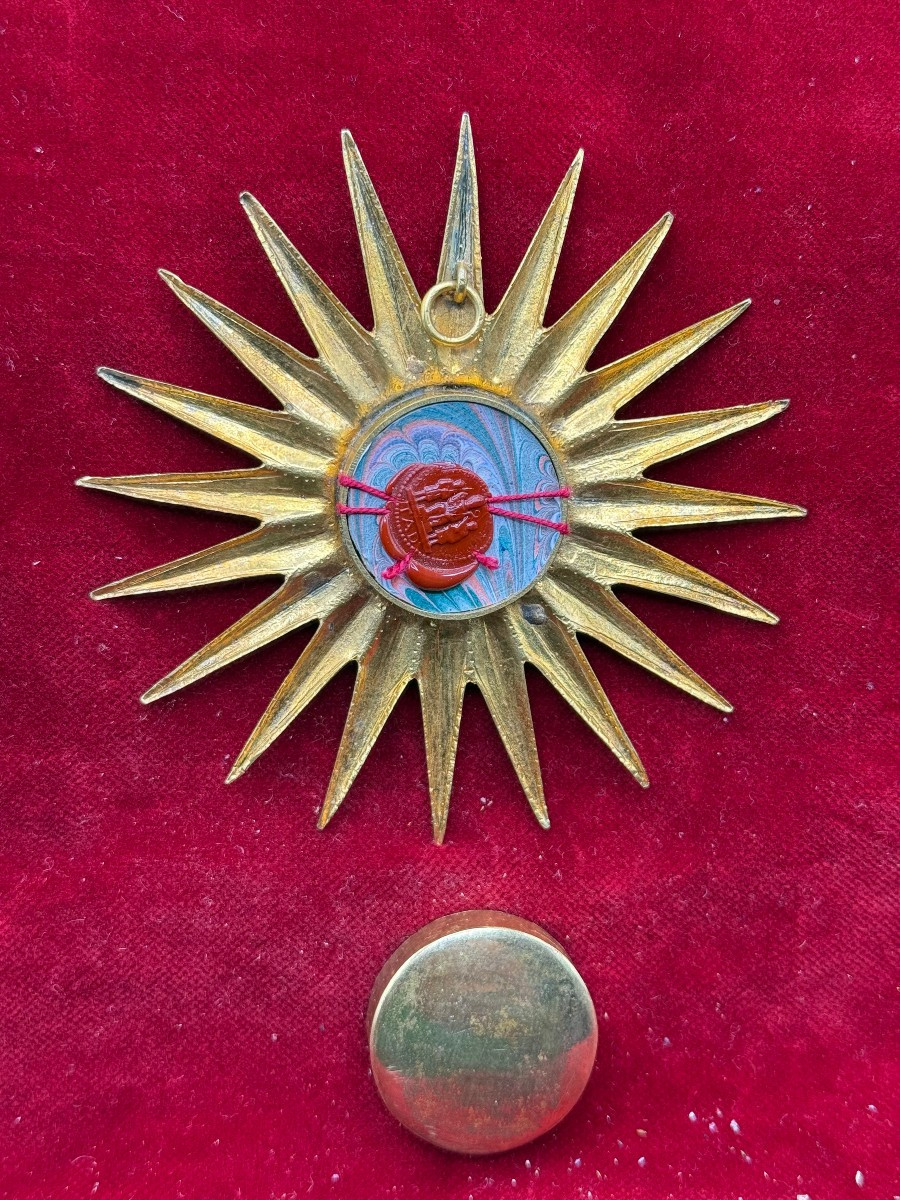 Reliquiario in bronzo a forma di stella dorata di un frammento della S.Croce di N.S.G.C.-photo-3