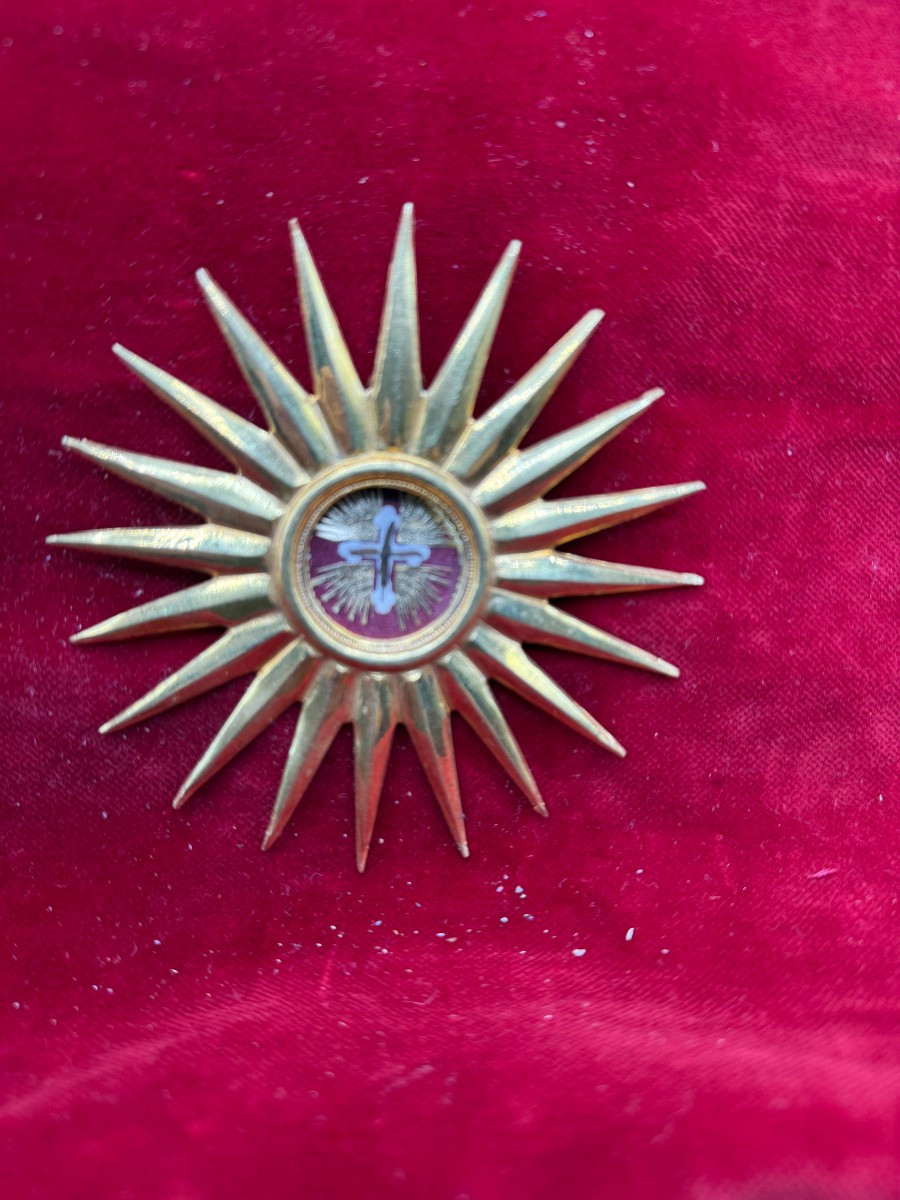 Reliquiario in bronzo a forma di stella dorata di un frammento della S.Croce di N.S.G.C.