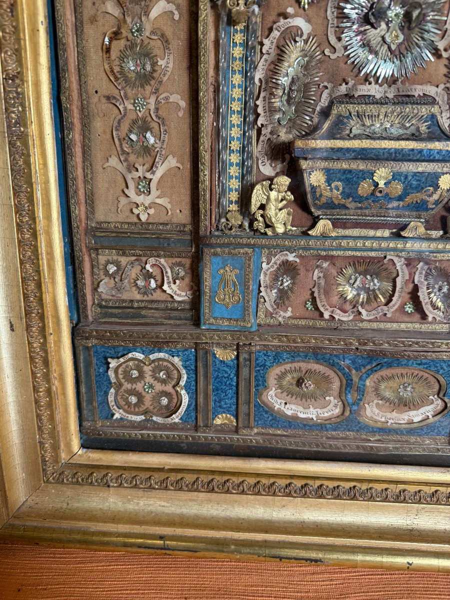 Paperolle con all'interno circa 50 frammenti di reliquie di santi-photo-3