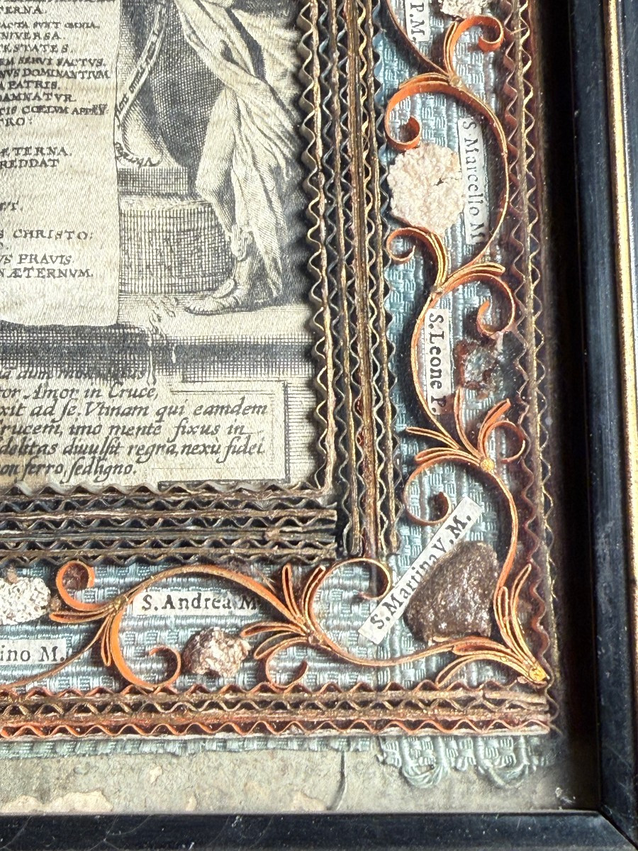 Quadro reliquiario  in cornice lignea ebanizzata con 24 frammenti di reliquie  -photo-1