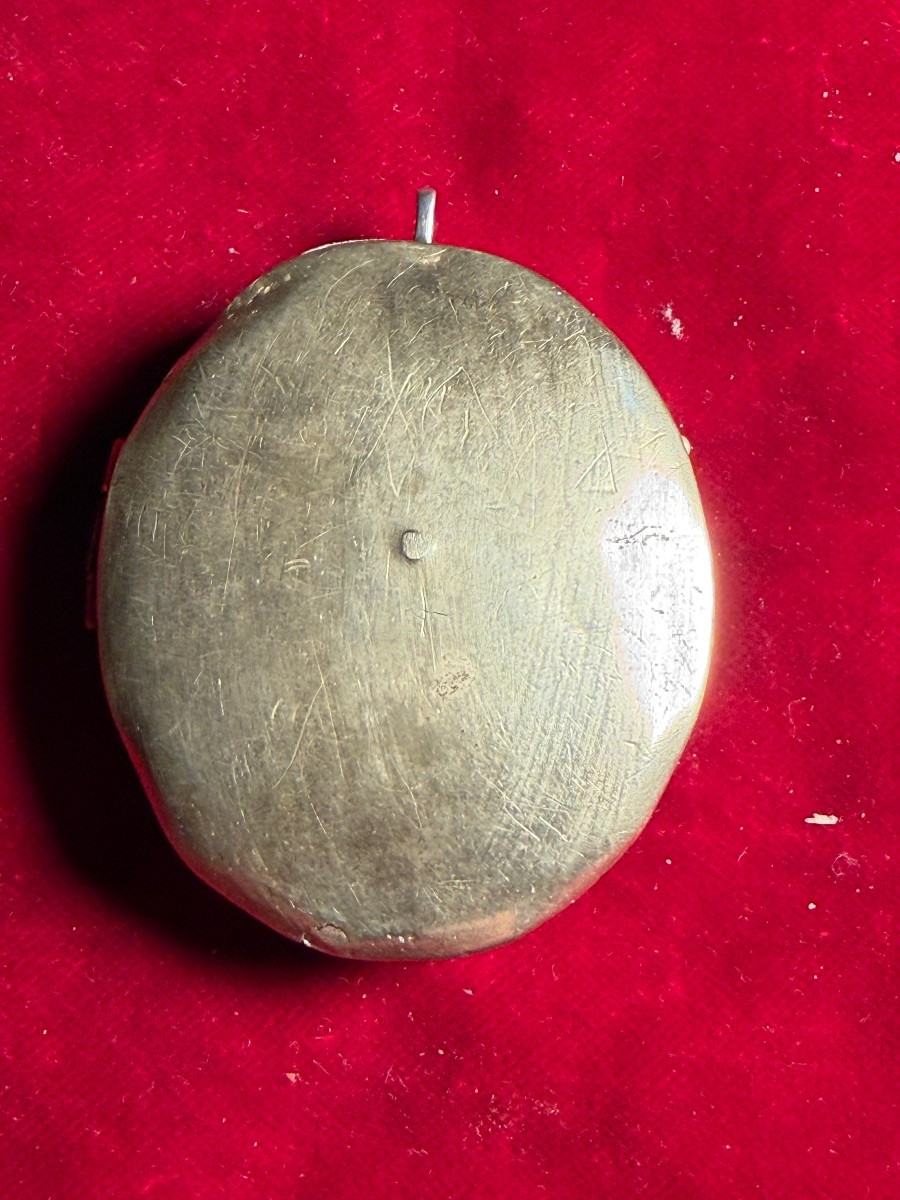 Reliquiario a medaglione a doppia faccia con 27 reliquie -photo-1