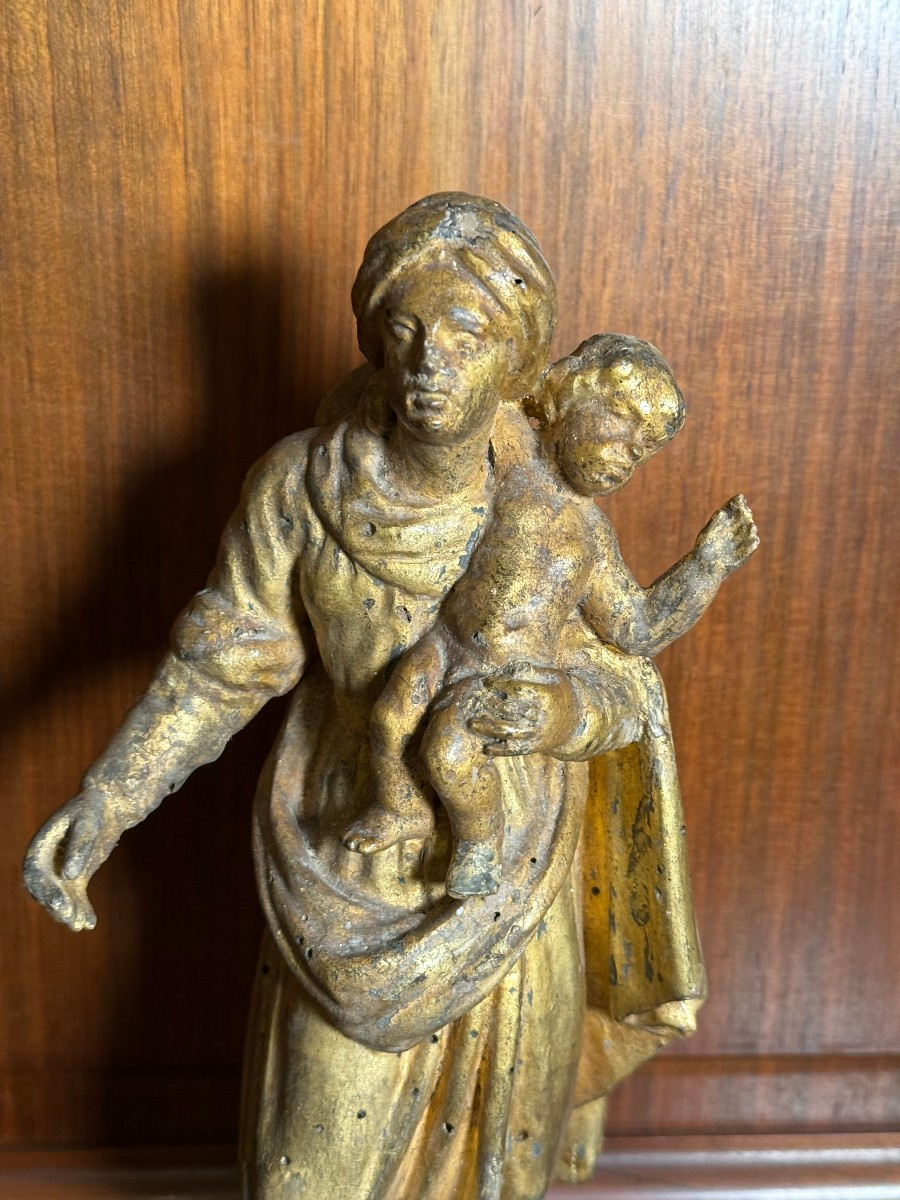Statuetta lignea dorata del '700 rappresentante Maria col Bambino con reliquia -photo-2