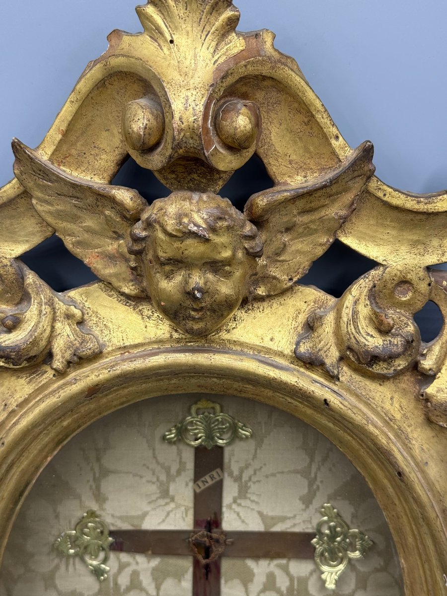 Reliquia della S.Croce di N.S.G.C. in cornice lignea ovale intagliata e dorata  -photo-1
