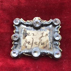 Reliquia dell'autografo di Santa Teresa d'Avila entro cornice in bronzo e argento