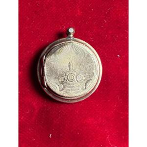 Reliquiario in oro basso cesellato  di S.Teresina di Gesù bambino 