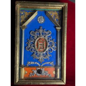 Filigrana in argento con le reliquie dei S.Antonio di Padova e Giustina entro cornice decorata 